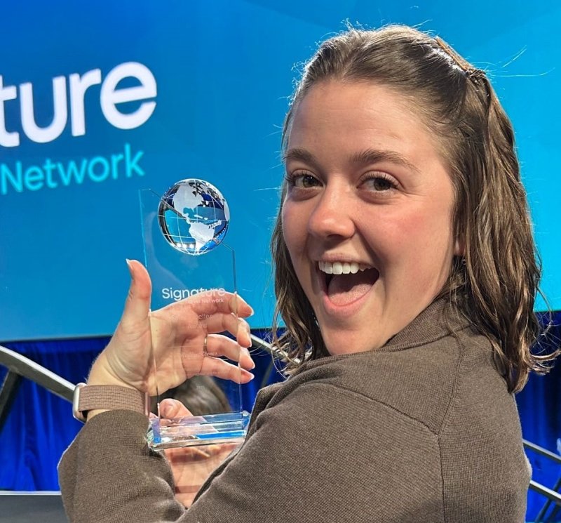 Reilly Reeves displays her Signature Sales Excellence Award. SUBMITTED PHOTO